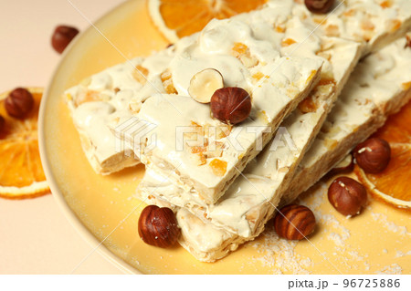 Concept of tasty food with nougat, close up Concept of tasty food with nougat, close up 96725886
