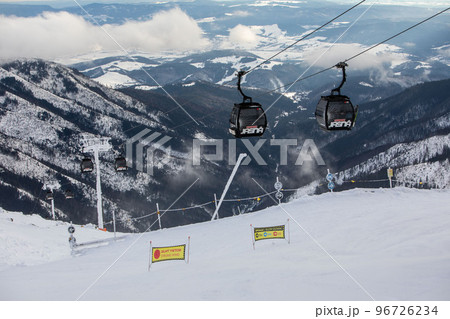 Slovakia, Jasna - February 3, 2022: chair lift cabin ski resort Slovakia, Jasna - February 3, 2022: chair lift cabin ski resort 96726234