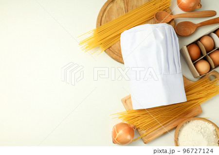 Concept of cooking food with chef hat, space for text Concept of cooking food with chef hat, space for text 96727124