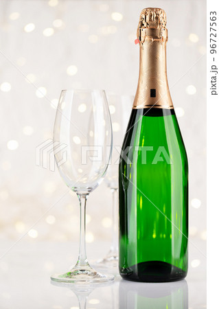 Champagne bottle and glasses Champagne bottle and glasses 96727563