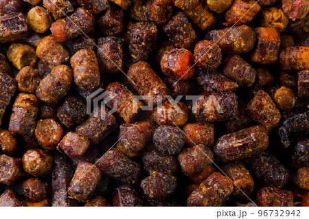 Bee perga, bee pollen background. Top view Bee perga, bee pollen background. Top view 96732942