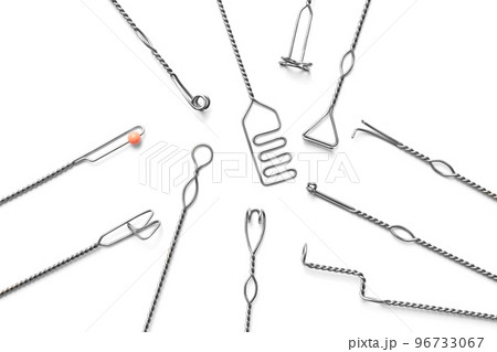 Set of logopedic probes on white background, top view. Speech therapist's tools 96733067