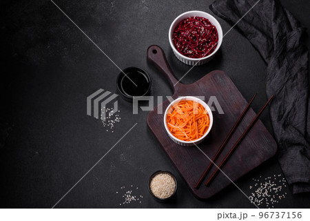 Tasty spicy Korean carrot with spices and herbs Tasty spicy Korean carrot with spices and herbs 96737156