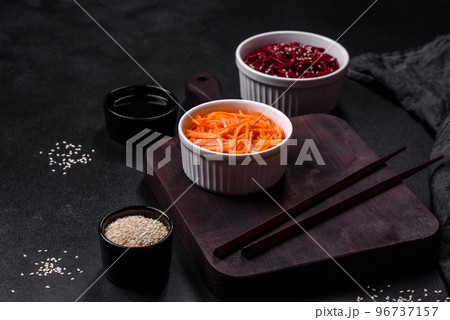 Tasty spicy Korean carrot with spices and herbs Tasty spicy Korean carrot with spices and herbs 96737157