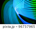 Neon technology stripes. Digital blue and green lines on black background. 96737965