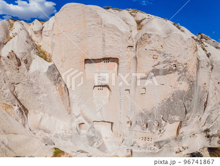 Beautiful stunning view of the mountains of Cappadocia and cave houses. Turkey Beautiful stunning view of the mountains of Cappadocia and cave houses. Turkey 96741867
