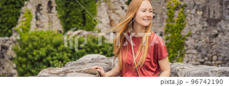 BANNER, LONG FORMAT Woman tourist walks through the old town of Bar in Montenegro. Happy tourist walks in the mountains. Suburbs of the city of Bar, Montenegro, Balkans. Beautiful nature and landscape BANNER, LONG FORMAT Woman tourist walks through the old town of Bar in Montenegro. Happy tourist walks in the mountains. Suburbs of the city of Bar, Montenegro, Balkans. Beautiful nature and landscape 96742190