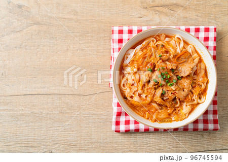 Korean udon ramen noodles with pork in kimchi soup Korean udon ramen noodles with pork in kimchi soup 96745594