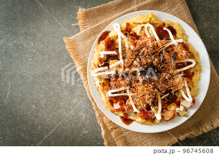 Japanese Traditional Pizza that called Okonomiyaki Japanese Traditional Pizza that called Okonomiyaki 96745608