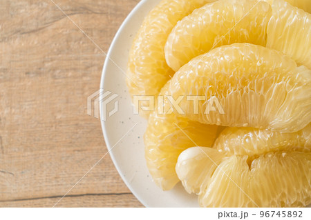 Fresh peeled pomelo, grapefruit or shaddock Fresh peeled pomelo, grapefruit or shaddock 96745892