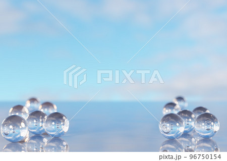 Product placement and advertising background. Glass balls on empty marble surface against blue sky with clouds. Backdrop for cosmetic products. 3d rendering 96750154