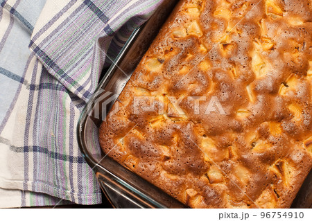 Home baked Lattice apple pie on wooden table. 96754910