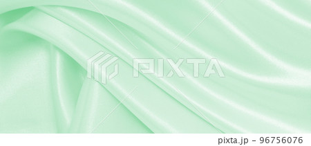 Smooth elegant green silk or satin luxury cloth texture as abstract background. Luxurious background design Smooth elegant green silk or satin luxury cloth texture as abstract background. Luxurious background design 96756076