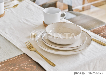 Table with decorations in light room at home 96756877