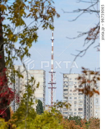 Telecommunication tower with multistory buildings Telecommunication tower with multistory buildings 96759065