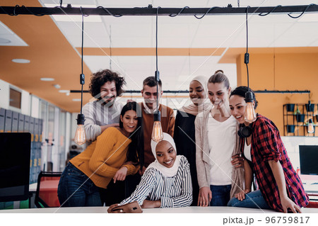Business people team group taking selfie photo on mobile phone at modern open space office coworking space 96759817