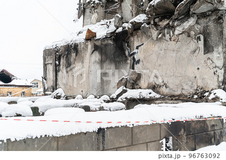 Graffiti by Banksy Gymnast Girl on the wall of a war-torn house in Borodyanka, Ukraine 96763092