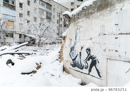 Banksy graffiti on a wall in Borodyanka, Ukraine Banksy graffiti on a wall in Borodyanka, Ukraine 96763251