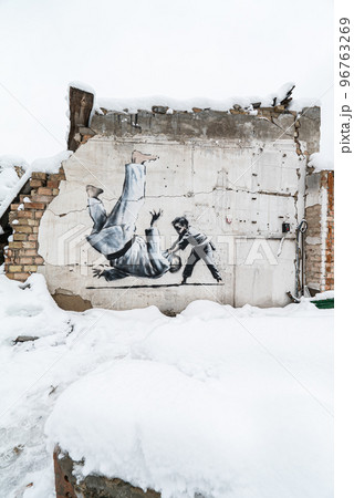 Ukraine, Borodyanka - Banksy graffiti on the wall Ukraine, Borodyanka - Banksy graffiti on the wall 96763269