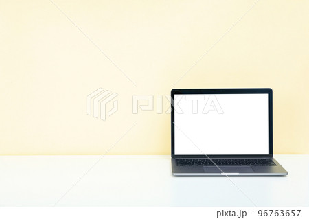 Laptop with blank screen on white table 96763657