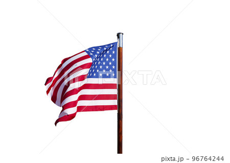 USA flag isolate. Waving flag of the United States of America on a flagpole on an empty white background. 96764244
