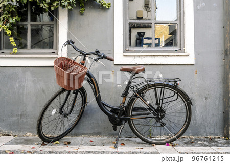 Retro bicycle on the old wall background. Vintage cycle for urban lifestyle concept. 96764245