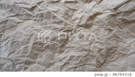 Top view photo of Crumpled craft paper. Paper background with copyspace. Vintage paper canvas texture abstract background. 96764318