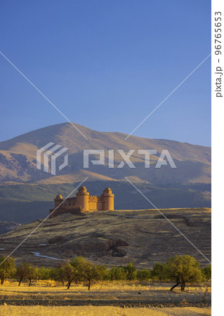 La Calahorra castle with Sierra Nevada, Andalusia, Spain La Calahorra castle with Sierra Nevada, Andalusia, Spain 96765653