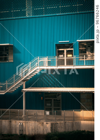 White metal staircase in front of the modern office building. 96766246