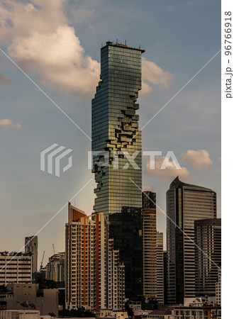 Architectural exterior view of King Power Mahanakhon Building is a mixed-use skyscraper with other modern high-rise buildings. 96766918