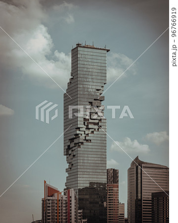 Architectural exterior view of King Power Mahanakhon Building is a mixed-use skyscraper with other modern high-rise buildings. 96766919