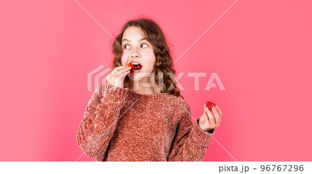 eating healthy. organic food only. Girl with strawberry. eating strawberry for breakfast. small kid eating berries. summer time childhood. Enjoying the moment. fruit full of vitamin. diet and dieting eating healthy. organic food only. Girl with strawberry. eating strawberry for breakfast. small kid eating berries. summer time childhood. Enjoying the moment. fruit full of vitamin. diet and dieting 96767296