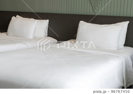 luxury bedroom interior with two beds and white pillow luxury bedroom interior with two beds and white pillow 96767450