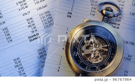 Pocket watch and operating budget numbers of financial calculation Pocket watch and operating budget numbers of financial calculation 96767964