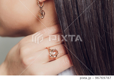 close up of boho styled woman hands with silver jewelry. 96769787