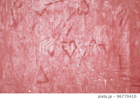 Defocused focus on Grunge beautiful red wall with cracks on plaster with space for text or image. Abstract drawings of hearts, lines and cracks on the background. stylized texture. Happy Valentine 96770410