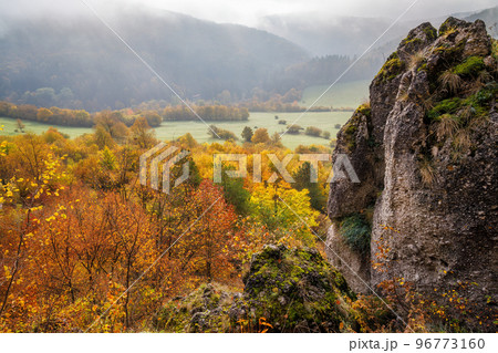 Mountain rocky landscape in autumn foggy morning. Mountain rocky landscape in autumn foggy morning. 96773160