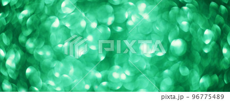 Green abstract background defocus lights round. Blurry glitter background. Green abstract background defocus lights round. Blurry glitter background. 96775489