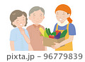 夏野菜の段ボールを持つ男性とシニア夫婦 96779839