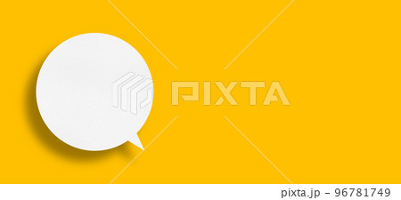 White paper in speech bubble shape set against yellow background. White paper in speech bubble shape set against yellow background. 96781749