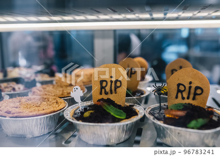 Tasty cookies for Halloween celebration in a shop window Tasty cookies for Halloween celebration in a shop window 96783241
