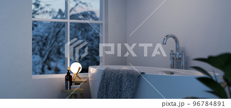 Modern comfortable bathroom in the evening with bathtub and romantic warm light from lamp 96784891