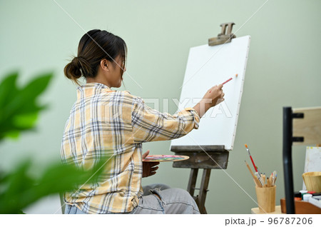 Professional Asian female artist painting onの写真素材