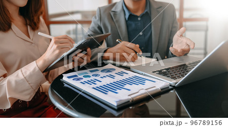 Business team meeting present.professional investor working with Finance managers task. with digital tablet,smartphone and laptop 96789156