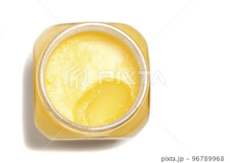 Ghee in jar isolated on white background Ghee in jar isolated on white background 96789968