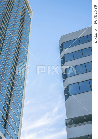 Skyscrapers towering in downtown Austin Texas under blue sky and clouds 96792589