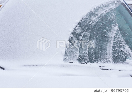 cleaning snow from the car cleaning snow from the car 96793705