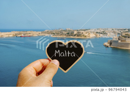 Malta in a heart-shaped sign, in the Port of Valletta Malta in a heart-shaped sign, in the Port of Valletta 96794043