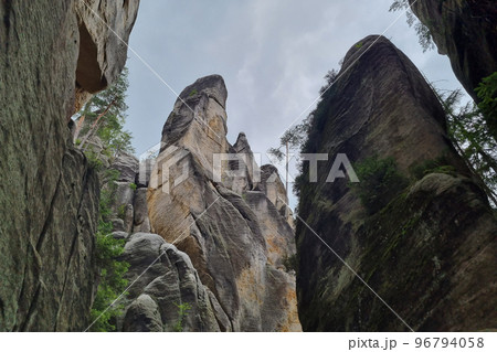 View from below of the large cliffs in the mountains. The background of nature. 96794058