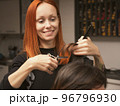 Womens fashion and style. Hair care, beauty industry concept. Hairdresser doing haircut closeup of 96796930